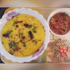 A picture of Rice and Moong dal khichdi with Roasted Tomato Chutni.