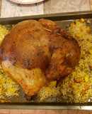 Chicken stuffed with rice, potatoes and green peas
