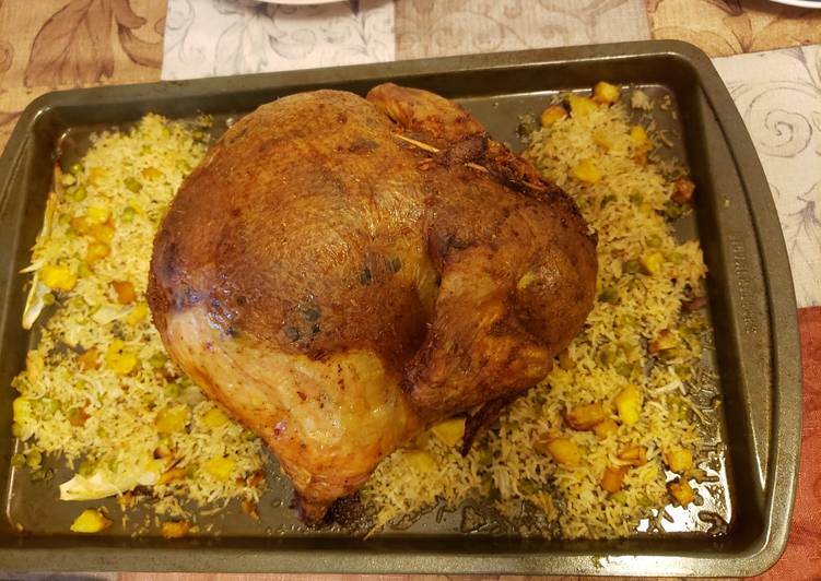 Recipe of Perfect Chicken stuffed with rice, potatoes and green peas