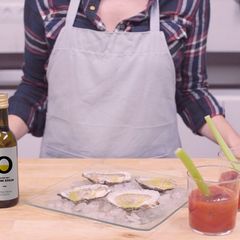 A picture of Bloody Mary and oysters.