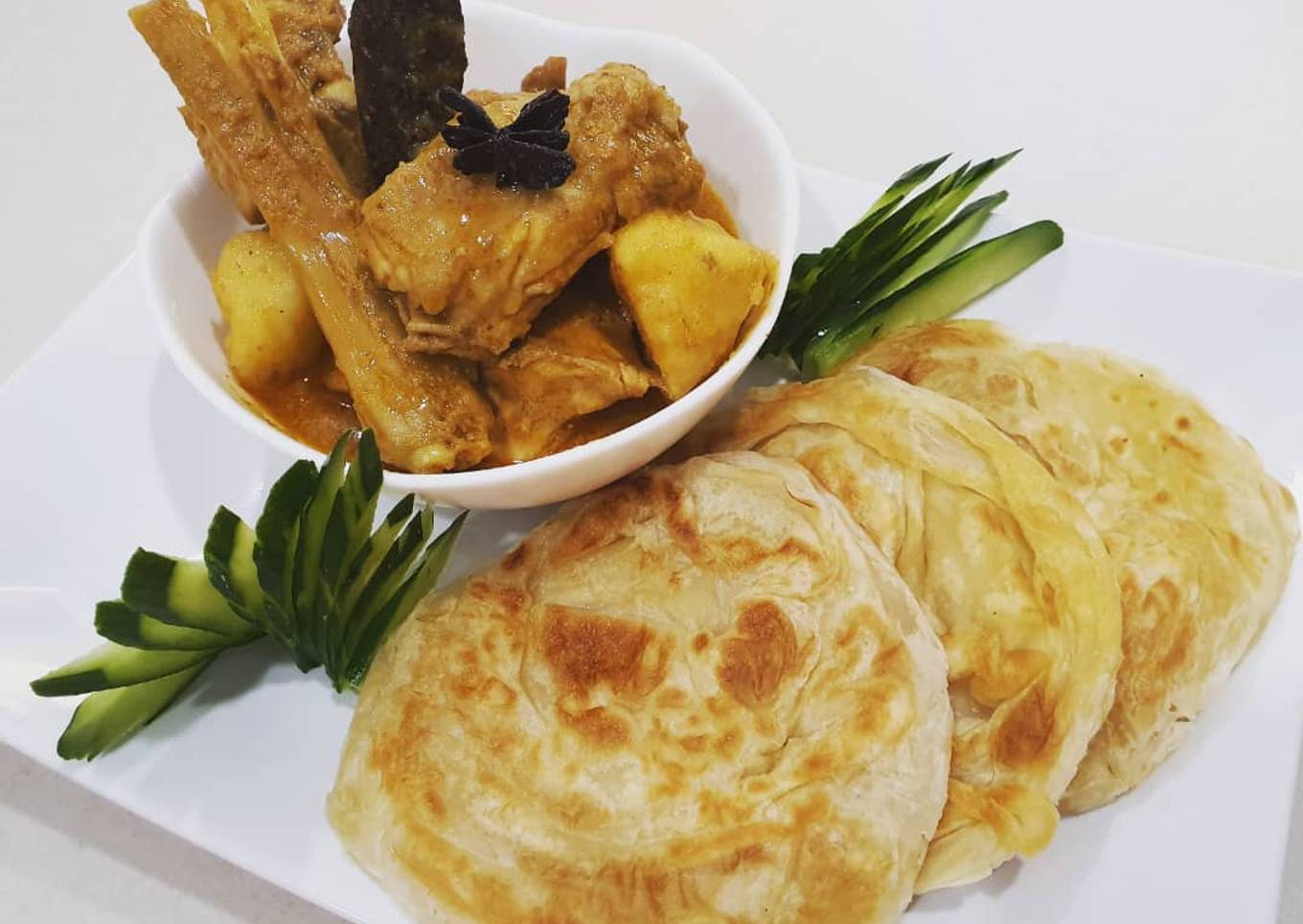 Chicken with Yogurt Curry with Oatmeal Roti Kanai