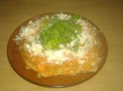 Una foto de spaghetti con salsa de calabaza