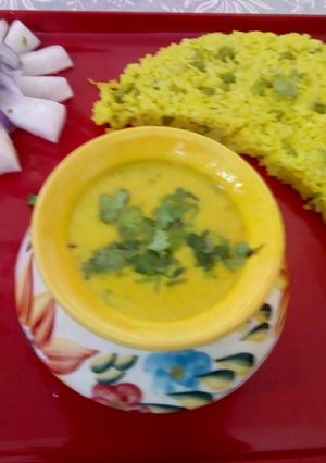 A picture of Peas pulao with Punjabi kadhi.