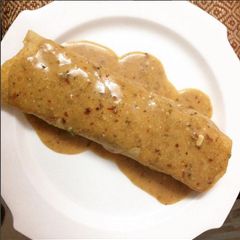 A picture of Vegetarian Enchiladas with buttermilk sauce.