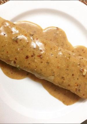 A picture of Vegetarian Enchiladas with buttermilk sauce.