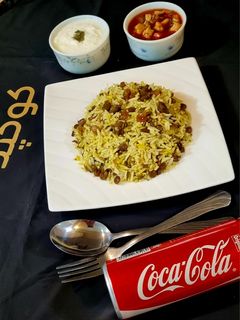 عکسی از دستور عدس پلو با کشمش و گوشت چرخ کرده