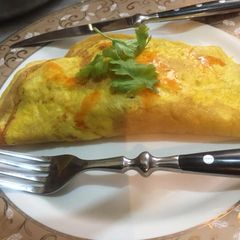 A picture of Chicken cheese omelette.
