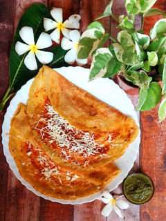 A picture of Moong Dal Cheela with stuffed Paneer.