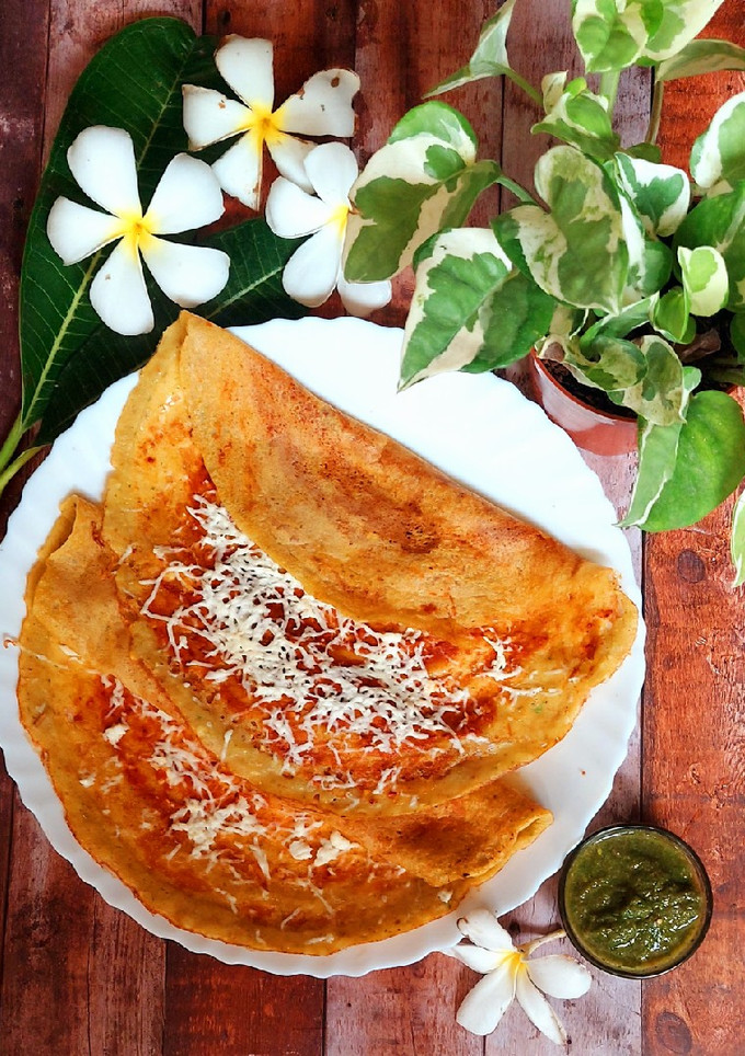 A picture of Moong Dal Cheela with stuffed Paneer.