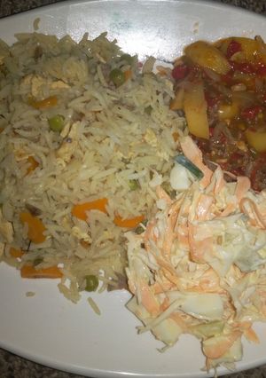 A picture of Chinese fried rice and coleslaw.