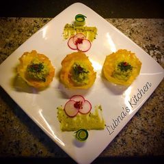 A picture of Cheddar Cups with Avocado Feta Mousse :.