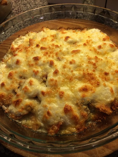 Una foto de Machas con crema y queso parmesano
