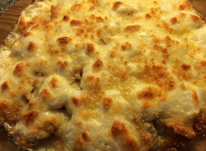 Una foto de Machas con crema y queso parmesano