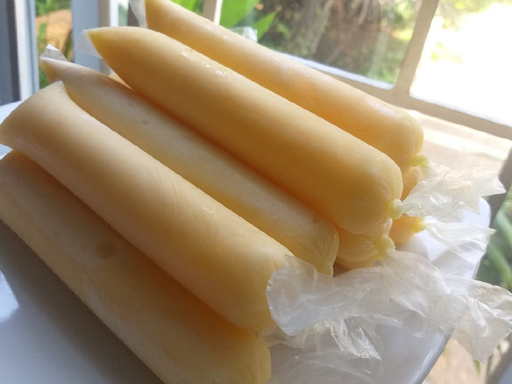 Bagaimana Menyiapkan Es lilin jeruk susu, Enak