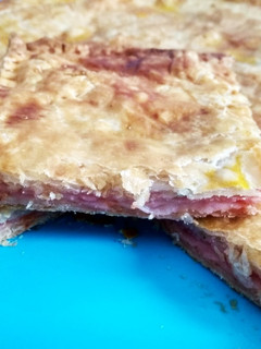 Una foto de Pastelón york-queso