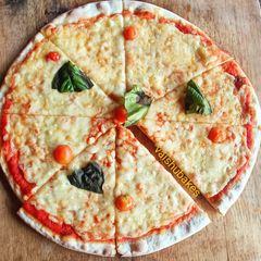 A picture of Basil Margherita Pizza.