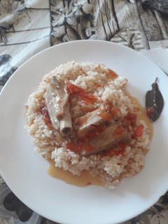 Una foto de Costillas con arroz