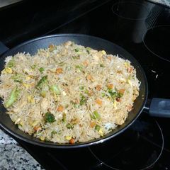 A picture of Hibachi rice and chicken.