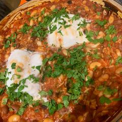 A picture of Smokey bean stew with cod.
