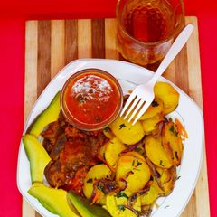 A picture of Sautéed potatoes with beef stew.
