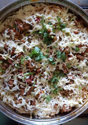 Una foto de Pasta bologñesa