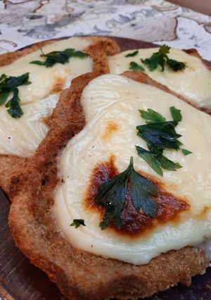 Una foto de Milanesas a la suiza