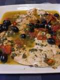 Filetti di trota salmonata con pomodorini e olive