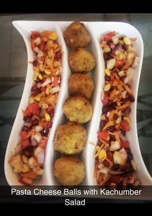 A picture of Pasta Cheese Balls with Kachumber Salad.