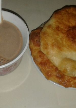 Una foto de Buñuelos con chocolatito caliente