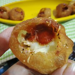 A picture of Golgappa Chicken Cheese Pizza.