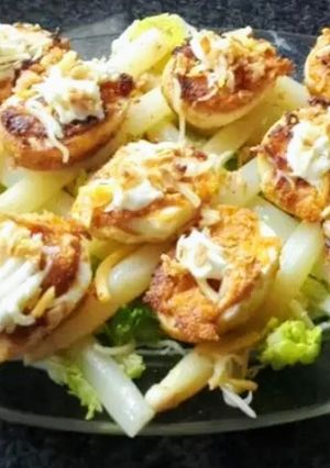 Una foto de Huevos rellenos calientes