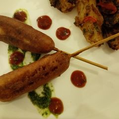 Corn Dogs with grilled potatoes A picture of Corn Dogs with grilled potatoes.