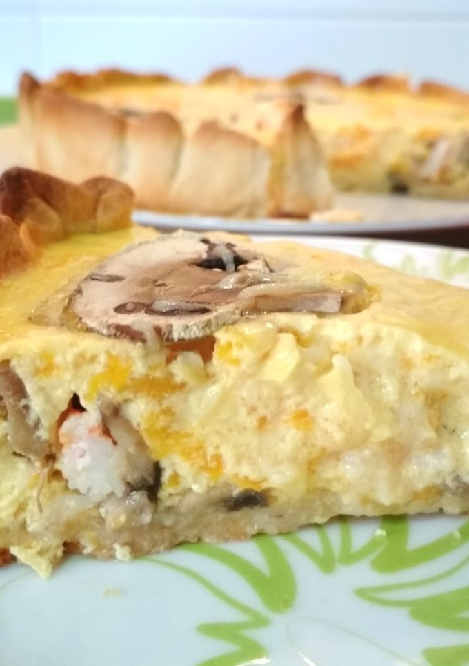 Una foto de Quiche cremosa del campo y del mar