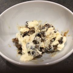 A picture of Leftover Christmas pudding and ice cream.