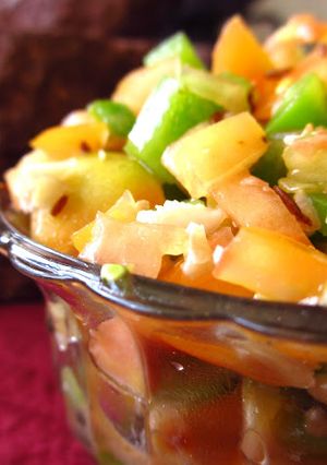 A picture of Capsicum and Green Tomato Salad.
