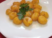 Una foto de ñoquis de calabaza
