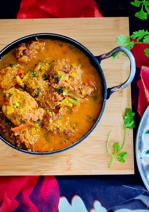 A picture of Bottle Gourd Fritters Curry.