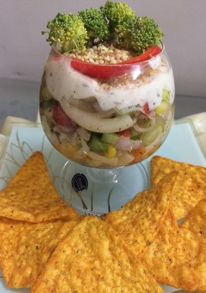 A picture of Greek layered elbow pasta salad.