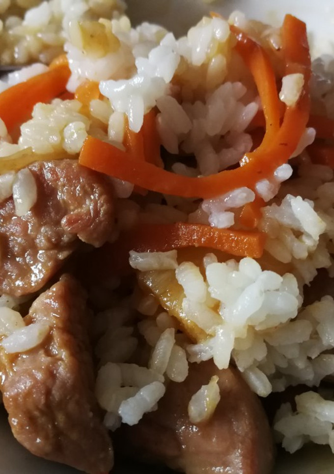 Una foto de Pavo con salsa agridulce y arroz