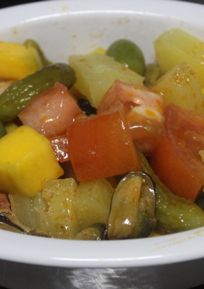 Una foto de Ensalada individual de mango y piña