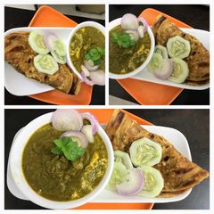 A picture of Palak (Spinach) Paneer & Whole Wheat Lachcha Paratha.