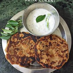 Crispy Rajgira/Amaranth Banana paratha with coconut chutney A picture of Crispy Rajgira/Amaranth Banana paratha with coconut chutney.