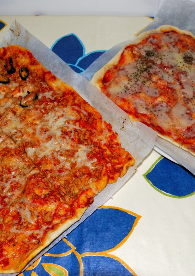 Una foto de Pizzas