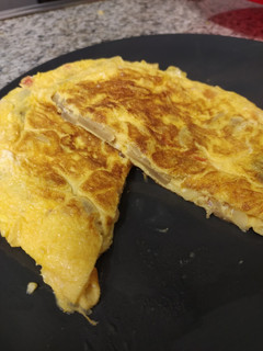 Una foto de 🥚 Tortilla de champiñones y queso