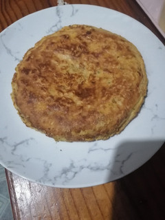 Una foto de Receta 02:00 am (tortilla de papas chips)
