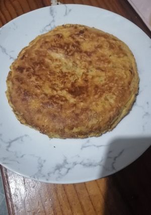 Una foto de Receta 02:00 am (tortilla de papas chips)