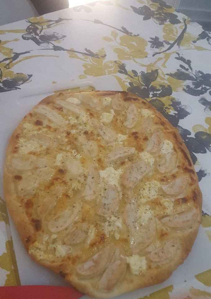 Una foto de Pizza de Pera, Queso de Cabra y Miel