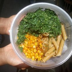 A picture of Coconut Brown Pasta, Yellow Daal & Sukuma.