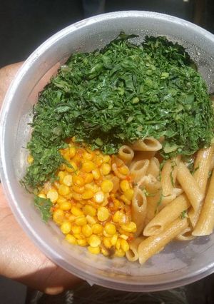 A picture of Coconut Brown Pasta, Yellow Daal & Sukuma.