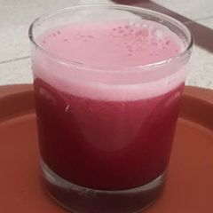 A picture of Orange, Carrot and Pomegranate juice.